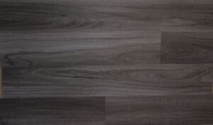 Porcelain tile and vinyl flooring meet in a busy home entryway with boots, mats, and everyday foot traffic.